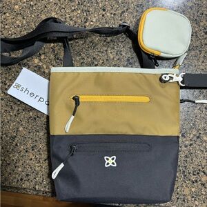 EUC Sherpani Sadie Crossbody bag in walnut.